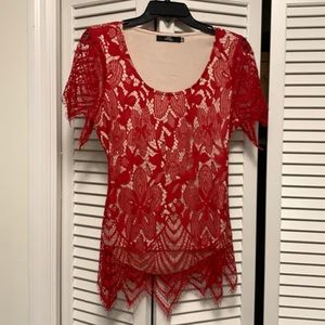 BKE boutique Red lace open back top . Nude lining. Size M